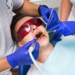 A patient receiving gentle Medi-Cal root canal treatment at Mission Dental Care in Oceanside, CA.