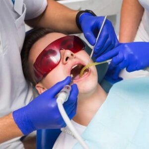 A patient receiving gentle Medi-Cal root canal treatment at Mission Dental Care in Oceanside, CA.